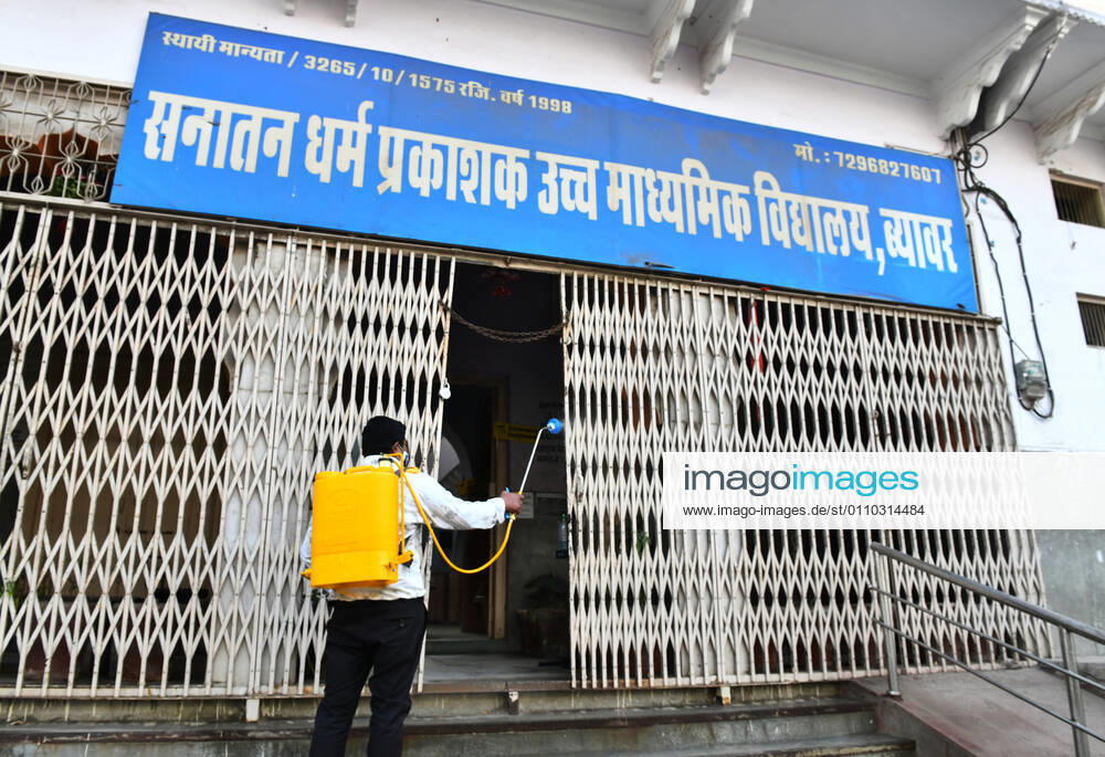 India: Schools reopened after 10 months in Rajasthan Worker sanitise a school that was reopened after remaining closed for 309 days due to COVID-19 pandemic in Beawar. Beawar Rajasthan India