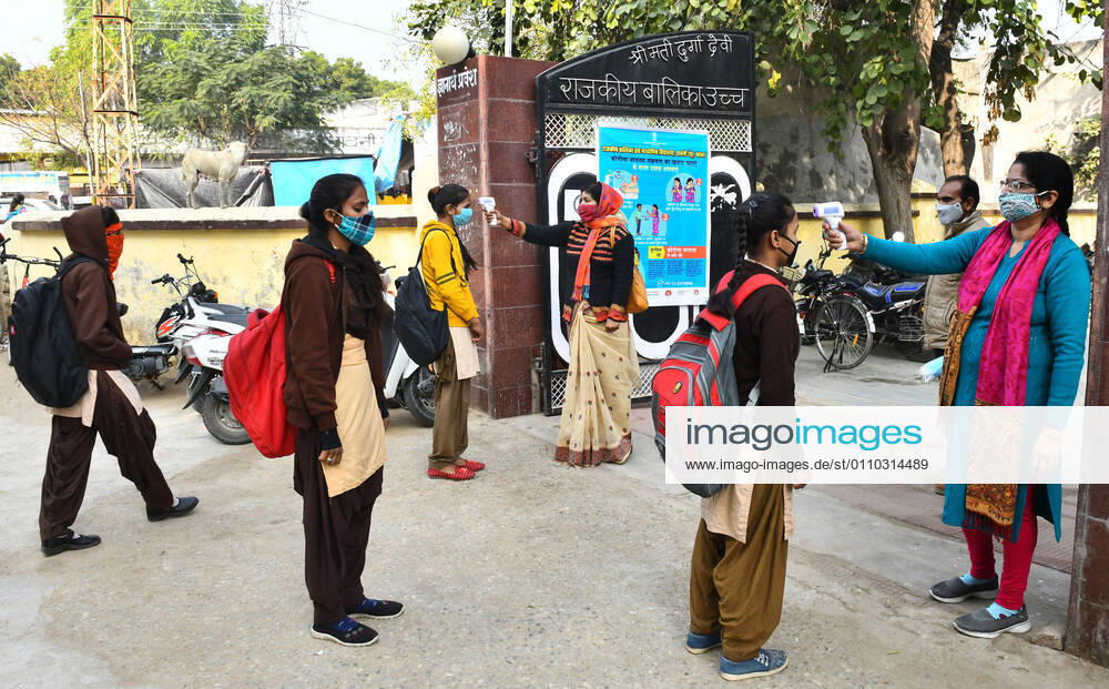 India: Schools reopened after 10 months in Rajasthan Students undergo thermal screening as they arrive to attend classes at a government school that was reopened after remaining closed for 309 days due to COVID-19 pandemic in Beawar. Beawar Rajasthan India