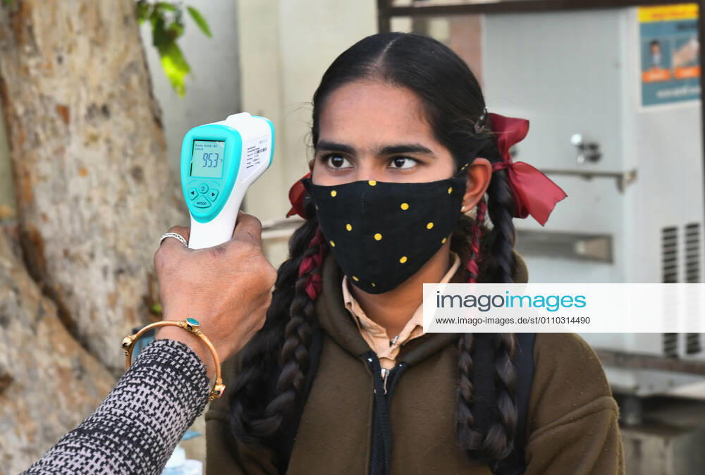 India: Schools reopened after 10 months in Rajasthan Student undergo thermal screening as she arrive to attend class at a government school that was reopened after remaining closed for 309 days due to COVID-19 pandemic in Beawar. Beawar Rajasthan India