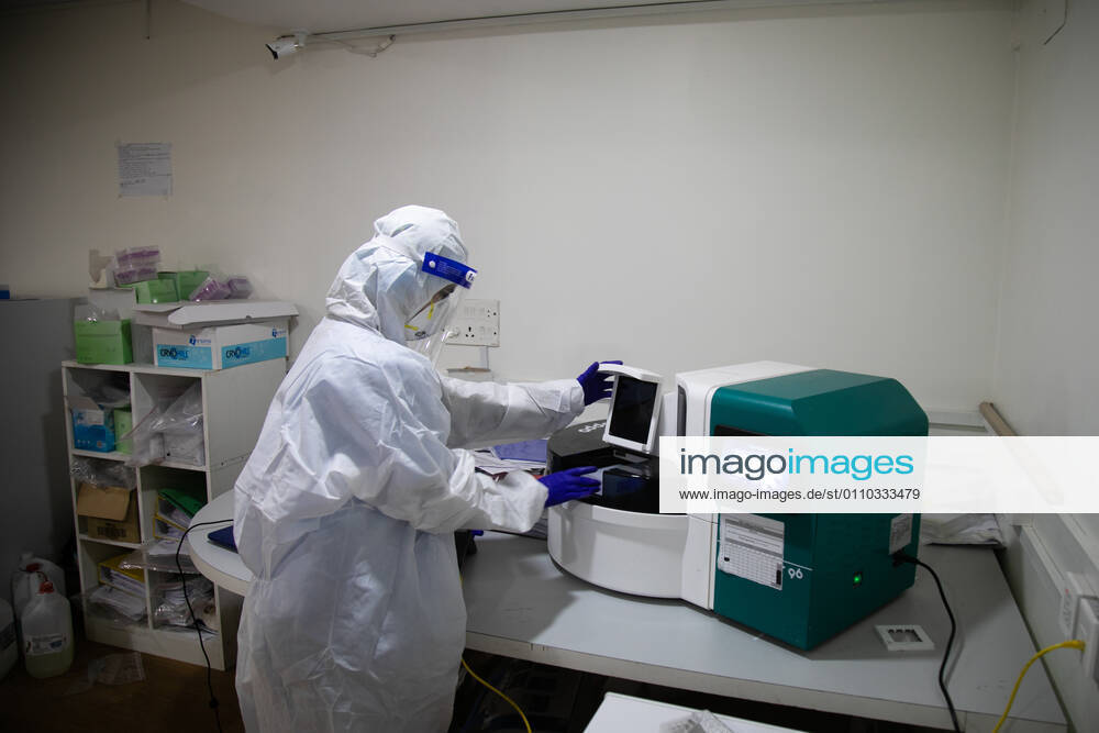 A laboratory technologist Srijana Adhikari wearing a personal protective equipment (PPE) seen processing the COVID-19 samples at the Bidh Lab..Nepal has confirmed that a new variant of coronavirus has entered Nepal as well. Issuing a statement on Monday the Ministry of Health and Population stated that three out of six people who arrived here from the UK a few days ago are found infected with the new variant. Kathmandu Nepal - ZUMAs197 20210118_zaa_s197_112