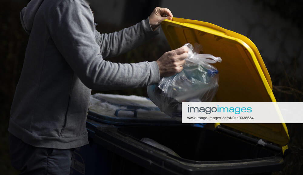Topic Illegal garbage disposal Quickly the garbage into the bin of the neighbor Bonn Germany