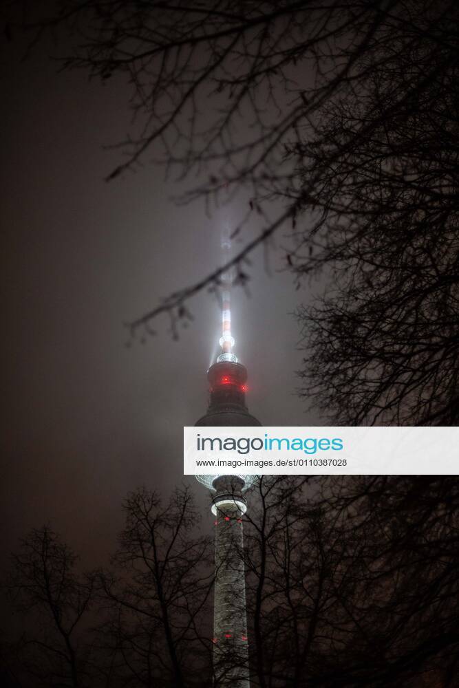 TV Tower enclosed by fog and rain, Persistent rain and temperatures around freezing point cause sleet and low clouds The clouds and sleet enclose the TV Tower, warmer temperatures are expected for the next few days Berlin Mitte Berlin Germany