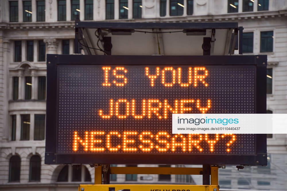 Is Your Journey Necessary? sign outside Liverpool Street Station in London..England remains under lockdown as the government battles to keep the coronavirus pandemic under control. London United Kingdom - ZUMAs197 20210119_zab_s197_011