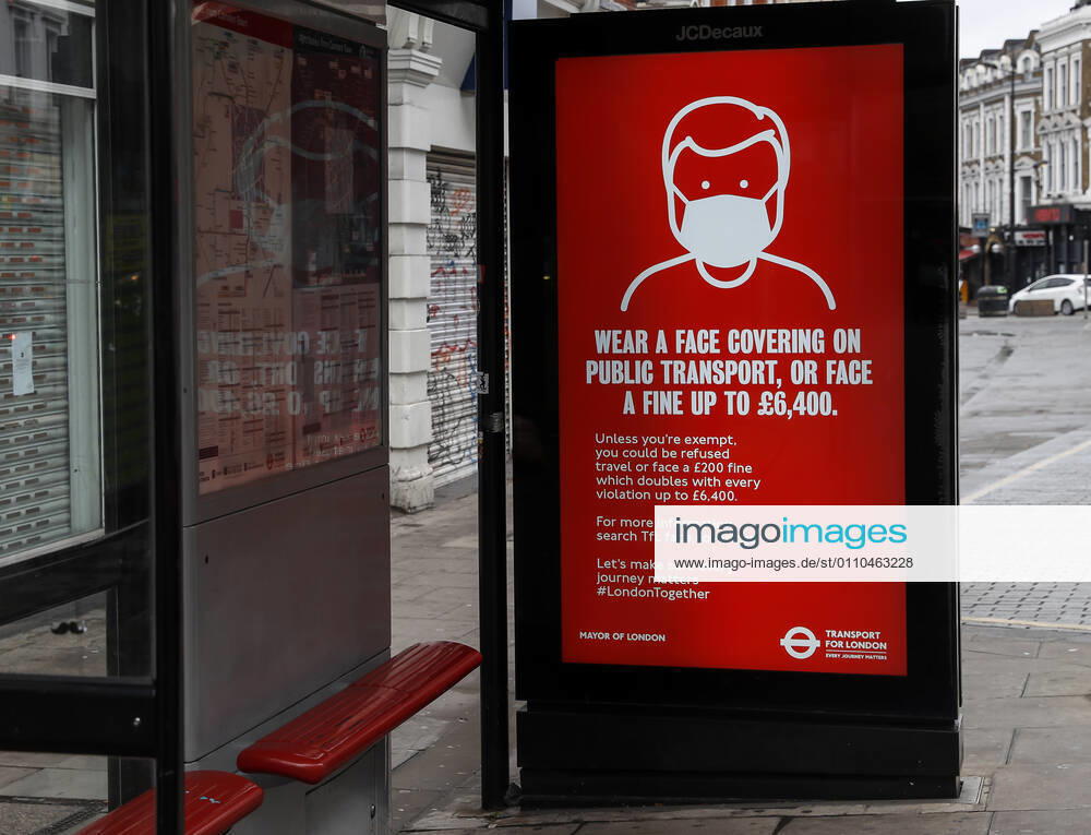 (210120) -- LONDON, Jan. 20, 2021 -- A public notice asking passengers to wear a face covering is seen at a bus stop in London, Britain, on Jan. 19, 2021. The number of people who have died within 28 days of a positive coronavirus test has surpassed the grim milestone of 90,000 in Britain after another 1,610 were confirmed, according to official figures released Tuesday. The latest daily death toll, the highest since the pandemic began in the country, brought the total number of coronavirus-related deaths in Britain to 91,470, the data showed. ) BRITAIN-LONDON-COVID-19-DEATH TOLL HanxYan