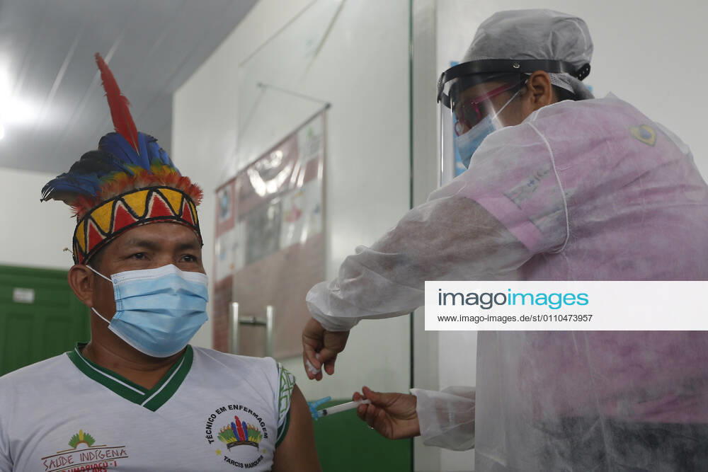 (210120) -- AMAZONAS, Jan. 20, 2021 -- A man receives a dose of China s COVID-19 vaccine in the city of Tabatinga in the state of Amazonas, Brazil, Jan. 19, 2021. Brazil launched a mass immunization campaign against the COVID-19 pandemic in every state starting at 5:00 p.m. Monday local time (2000 GMT). As of Monday afternoon, all states were expected to have received their doses of the CoronaVac vaccine developed by Chinese laboratory Sinovac in collaboration with the Butantan Institute of Sao Paulo, one of the world s leading scientific research centers. (Photo by Xinhua) BRAZIL-AMAZONAS-COVID-19-VACCINE-MASS INOCULATION LucioxTavora
