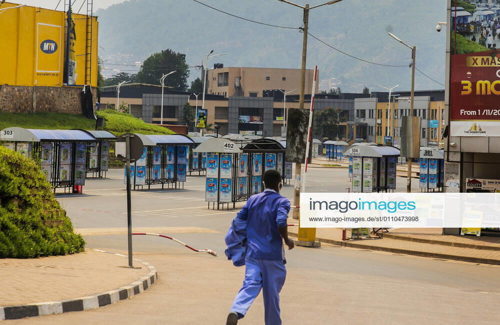 (210120) -- KIGALI, Jan. 20, 2021 -- A man runs past an empty bus station in Kigali, Rwanda, Jan. 19, 2021. Rwandan cabinet on Monday brought the capital city of Kigali back to a lockdown due to a surge in COVID-19 cases. The lockdown, which became effective immediately and will be reviewed after 15 days, prohibits unnecessary movements in the city. (Photo by Xinhua) RWANDA-KIGALI-COVID-19-LOCKDOWN CyrilxNdegeya