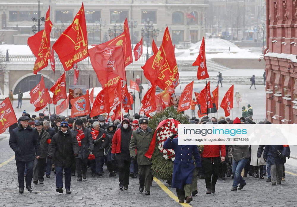 People take part in a flower laying ceremony at Lenin s Mausoleum on the day of the 97th death anniversary of Russian revolutionary Vladimir Lenin. Mikhail Japaridze TASS TS0F4BBC