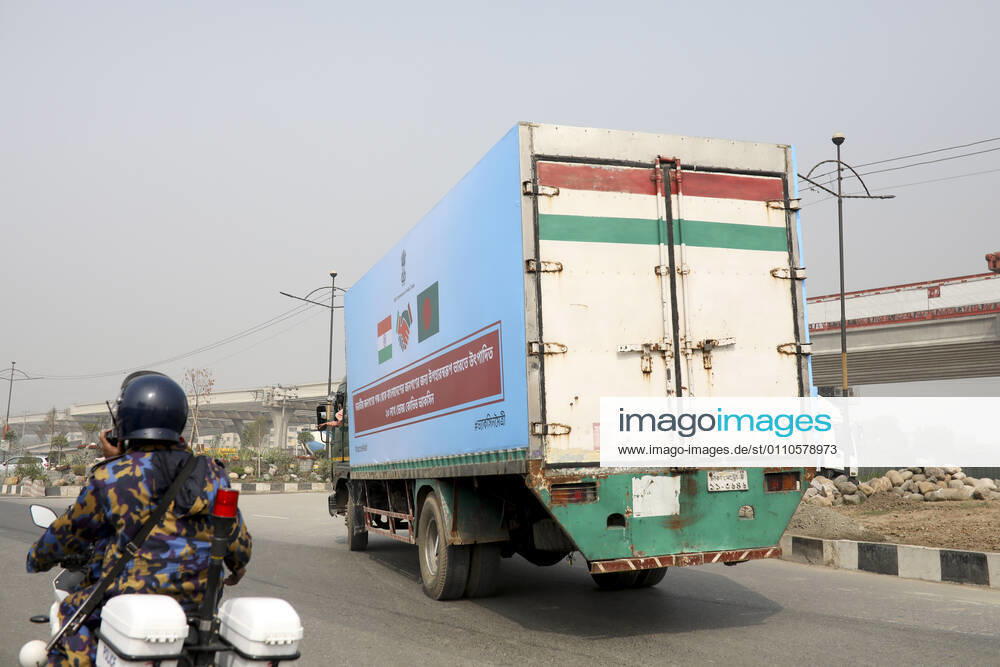 A pickup van carries Oxford-Astrazeneca COVID-19 vaccines, which arrived from India as a gift to Bangladesh, from the Hazrat Shahjalal International Airport to the storage house, in Dhaka, Bangladesh. Dhaka Bangladesh - ZUMAr165 20210121_zip_r165_001