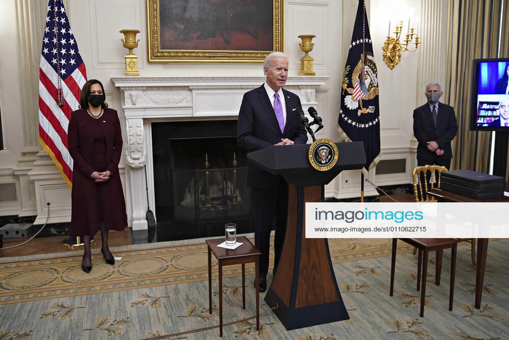 U.S. President Joe Biden speaks as U.S. Vice President Kamala Harris, left, and Anthony Fauci, director of the National Institute of Allergy and Infectious Diseases, right, listen during an event on his administration s Covid-19 response in the State Dining Room of the White House in Washington, D.C., U.S., on Thursday, Jan. 21, 2021. Biden in his first full day in office plans to issue a sweeping set of executive orders to tackle the raging Covid-19 pandemic that will rapidly reverse or refashion many of his predecessor s most heavily criticized policies. Photographer: Al Drago Bloomberg.Credit: Al Drago Pool via CNP Washington USA - ZUMAs152 20210121_zaa_s152_126