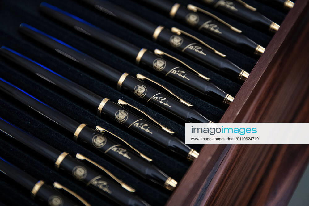 Pens bearing the signature of U.S. President Joe Biden before an event on the Biden administration s Covid-19 response in the State Dining Room of the White House in Washington, D.C., U.S., on Thursday, Jan. 21, 2021. Biden in his first full day in office plans to issue a sweeping set of executive orders to tackle the raging Covid-19 pandemic that will rapidly reverse or refashion many of his predecessor s most heavily criticized policies Washington USA - ZUMAs152 20210121_zaa_s152_168