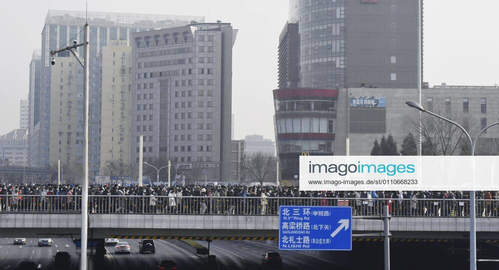 PCR tests in Beijing People wait in line to take PCR tests in Beijing s Xicheng district on Jan. 22, 2021, amid renewed concerns over the spread of the novel coronavirus.