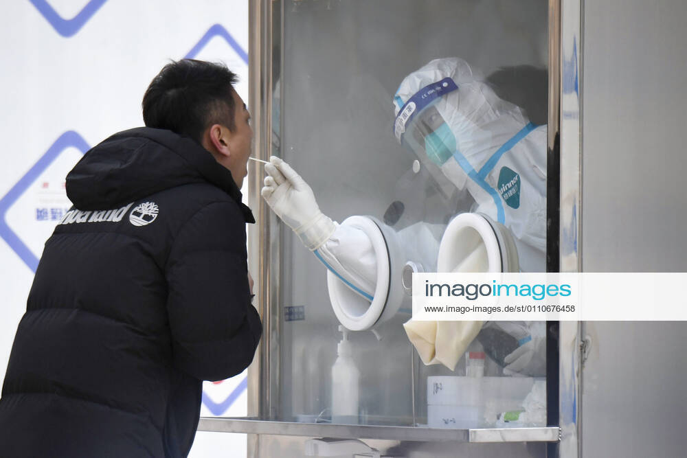 PCR tests in Beijing A local resident takes a PCR test in Beijing s Xicheng district on Jan. 22, 2021, amid renewed concerns over the spread of the novel coronavirus.