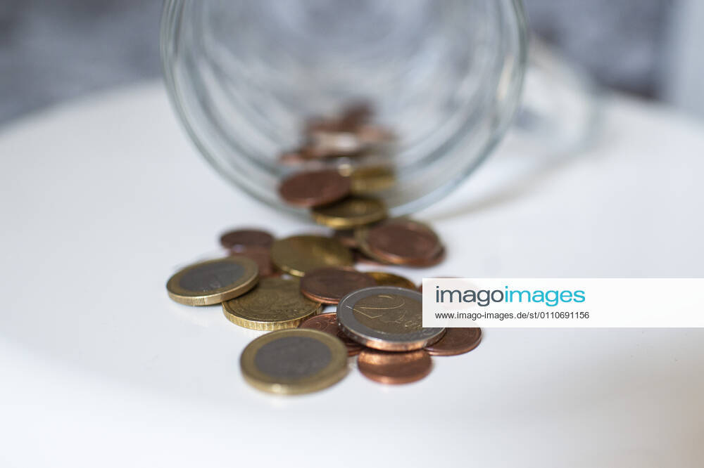 Feature Money Money in the form of coins lies on a shelf Photo Wedel Kirchner Media Nordrhein Westfalen Germany