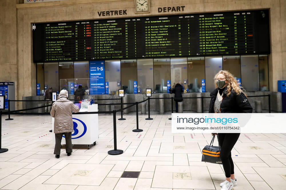 (210123) -- BRUSSELS, Jan. 23, 2021 -- Passengers are seen at the Brussels Central Station in Brussels, Belgium, Jan. 22, 2021. Belgium will start to ban non-essential travel from or to the country starting on Jan. 27, Prime Minister Alexander De Croo announced Friday. The ban will be valid until March 1. ) BELGIUM-BRUSSELS-COVID-19-TRAVEL BAN ZhangxCheng
