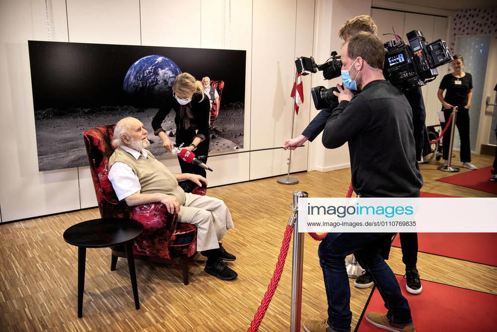 Resident Carl Einar Joergensen receives second vaccine from Pfizer BioNTech by doctor Puk Laugen at Plejecenter Faelledgaarden in OEsterbro in Copenhagen, Saturday 23 January 2021, Copenhagen
