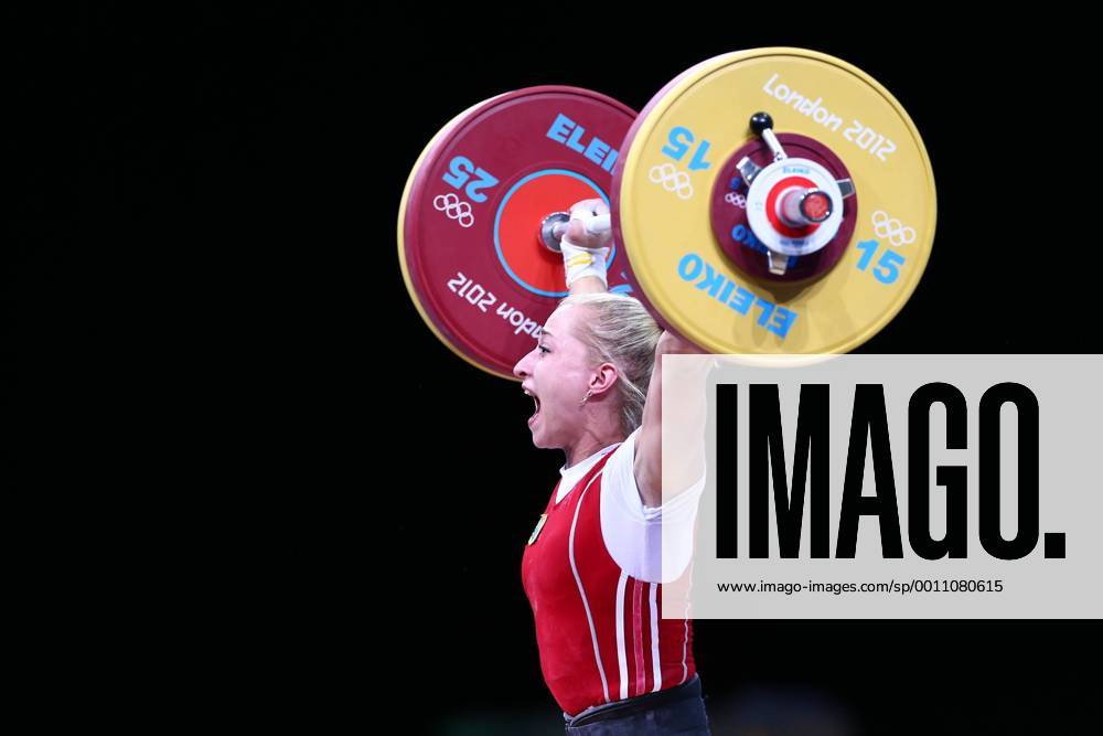 (120730) -- LONDON, July 30, 2012 (Xinhua) -- Yuliya Kalina of Ukraine competes during women s weightlifting 58kg competition, at London 2012 Olympic Games in London, Britain, on July 30, 2012. Yuliya Kalina of Ukraine won silver medal with a total weight of 236kg. (Xinhua Chen Jianli) (nxl) (OLY2012)BRITAIN-LONDON-WEIGHTLIFTING-WOMEN S 58KG