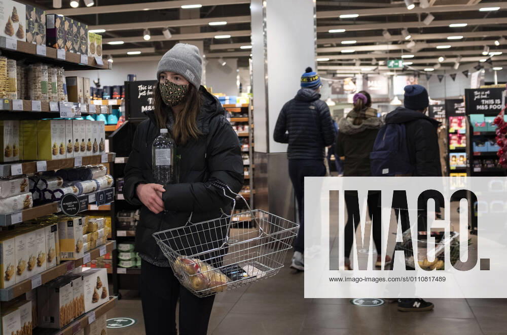 People are seen at Mark & Spencer, a British multinational retailer in Stratford, the London Borough of Newham, England, UK on January 23, 2021. Some of England s Covid hotspots are still in London Hounslow, Ealing, Brent, Barking and Dagenham and Newham are the boroughs which fall in the country s top 10 for worst case rates. London United Kingdom - ZUMAj323 20210123_zip_j323_002