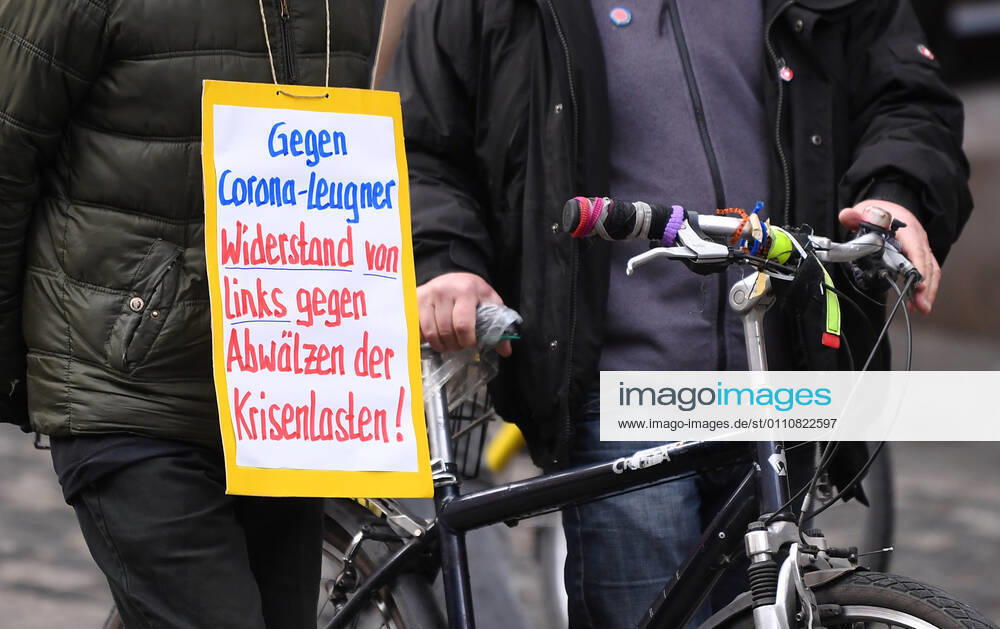 Tuebingen 23 01 2021 Theme picture, demonstrator with banner in Tuebingen city centre Against Corona deniers, resistance from the left against those who are rolling off the burden of the crisis ulmer