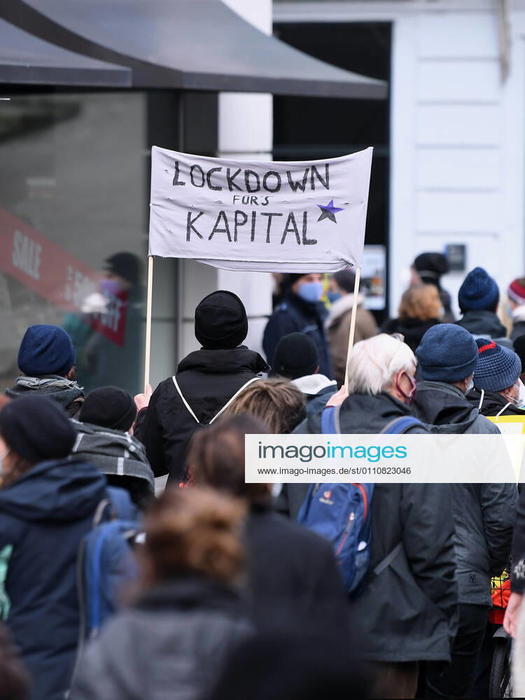 Tuebingen 23 01 2021 A left demo against Corona crisis management under the motto, solidarity instead of authority in Tuebingen A banner with the inscription Lockdown for capital ulmer