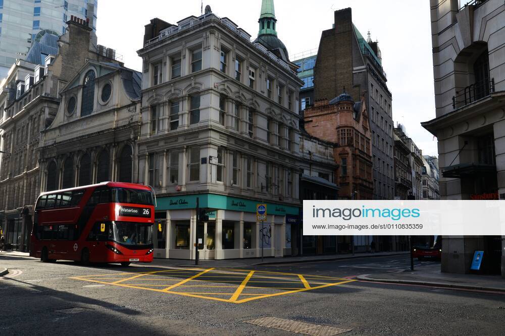 A bus drives on an empty Gracechurch Street during the third national lockdown..Prime Minister Boris Johnson announced that there was evidence that the new variant of the coronavirus is more deadly. London United Kingdom - ZUMAs197 20210123_zaa_s197_143