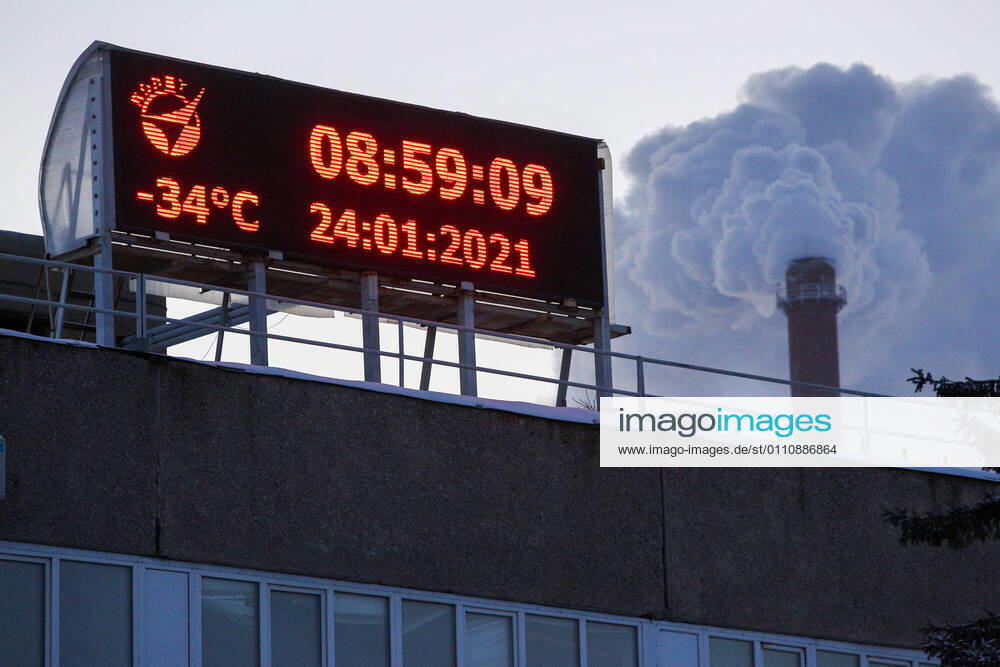 A digital board displays the current time, date and air temperature in the Siberian city. The temperature has plummeted below -36°C -32.8°F in Omsk and settled at -43°C 45.4°F across the region. Yevgeny Sofiychuk TASS TS0F5126