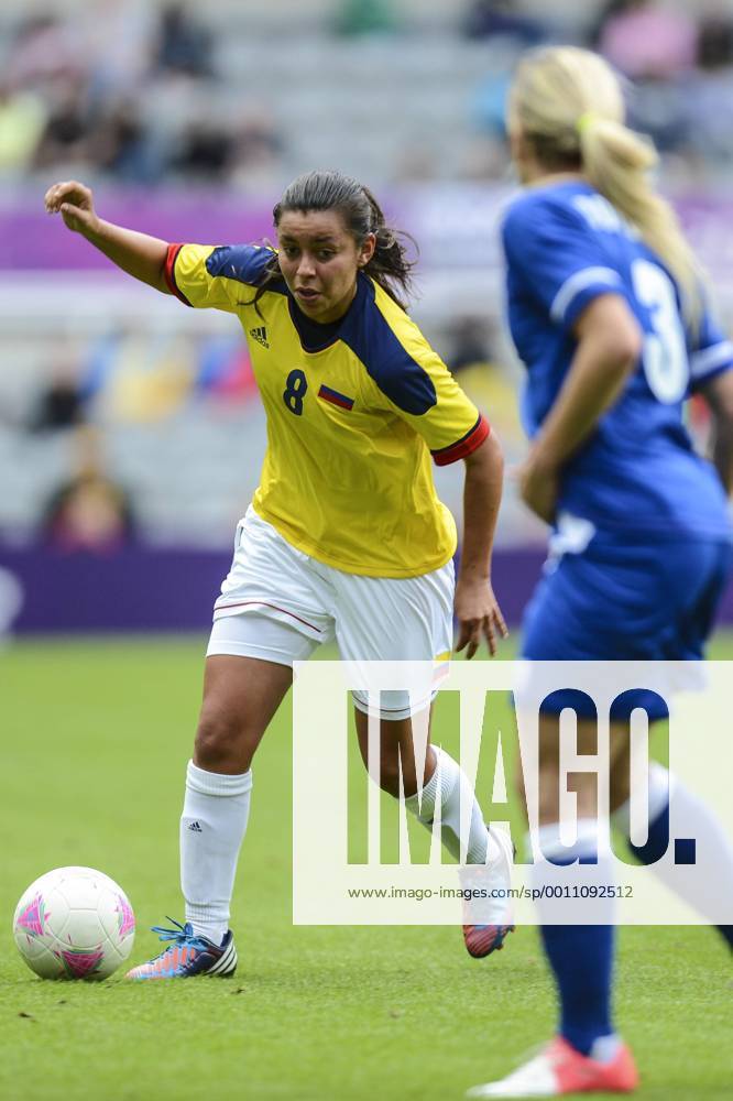 Newcastle, England. Yoreli Rincon of Columbia is desperate for a way through France s defence during the Olympic Football Women s Preliminary game between France and Columbia from St James Park. xReubenxTabnerx ActionPlus11309512