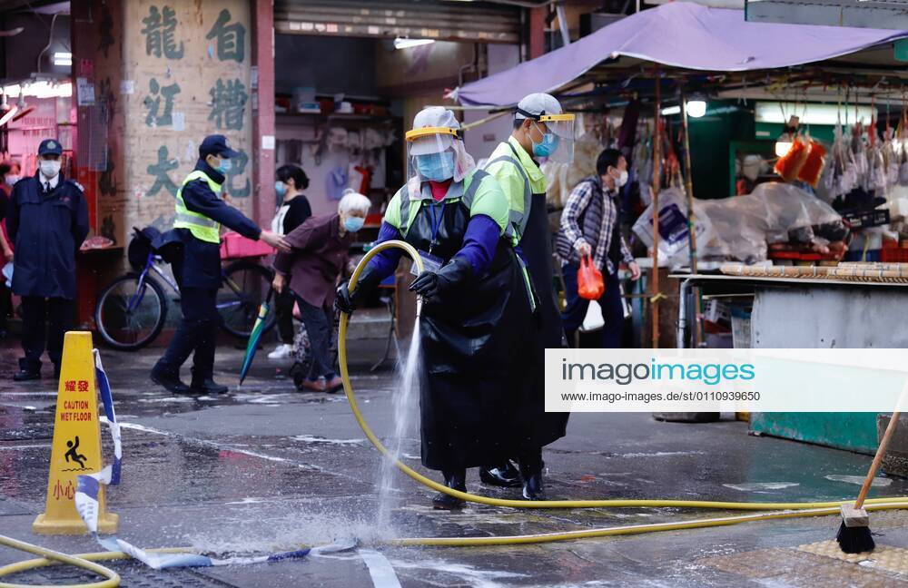 Workers sanitizing Yau Ma Tei Wet Market in the restricted zone early this morning after HK Government have lifted partial lockdown in the area which lasted for 48hrs.Jan-25,2021Hong Kong.ZUMA Hong Kong CHINA - ZUMAl137 20210125_zap_l137_005