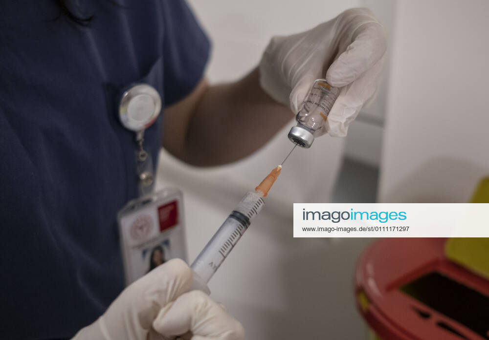 (210127) -- ISTANBUL, Jan. 27, 2021 -- A medical worker prepares a dose of COVID-19 vaccine in Istanbul, Turkey, Jan. 27, 2021. A state hospital in Turkey s largest city Istanbul Wednesday was filled with senior citizens who came to be vaccinated against COVID-19 as part of the ongoing mass inoculation program in the country. TO GO WITH Feature: Turkish seniors hope pandemic to end with COVID-19 vaccines (Photo by Xinhua) TURKEY-ISTANBUL-VACCINATION OsmanxOrsal