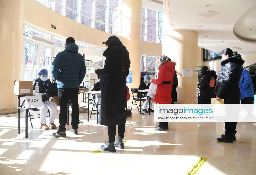 (210129) -- BEIJING, Jan. 29, 2021 -- Recipients wait for registration before the COVID-19 vaccination at a temporary vaccination site in Haidian District of Beijing, capital of China, Jan. 29, 2021. The administration of the second dose of COVID-19 vaccines for key groups of residents throughout Beijing started on Jan. 22, and is expected to conclude before Feb. 8. ) CHINA-BEIJING-COVID-19-VACCINATION-2ND-DOSE (CN) RenxChao
