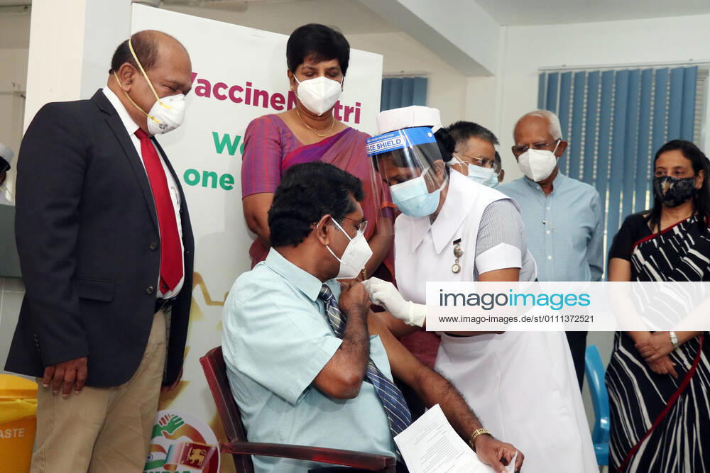 (210129) -- COLOMBO, Jan. 29, 2021 -- Dr. Ananda Wijewickrama receives a dose of COVID-19 vaccine at the National Infectious Disease Hospital (IDH) in Colombo, Sri Lanka, Jan. 29, 2021. Sri Lanka s health officials on Friday kicked off the country s first COVID-19 vaccination program by inoculating a senior consultant physician at the National Infectious Disease Hospital (IDH) who has been in the front lines of the pandemic, local media reported. Dr. Ananda Wijewickrama was the first medical officer to receive the jab on Friday morning, which was monitored by hospital staff and government officials. A senior nurse at the IDH was the second to receive the jab while three military officers also received the jab at the Army Hospital i