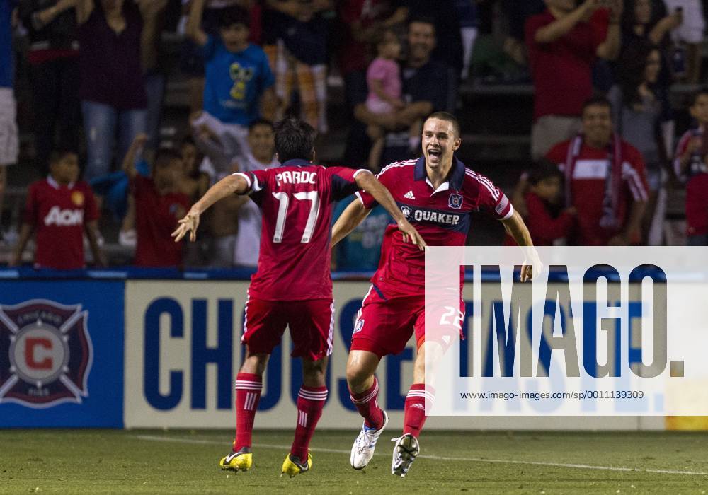 Aug. 5, 2012 - Bridgeview, Illinois, U.S - Chicago Fire defender AUSTIN BERRY (22) celebrates his second-half goal against Toronto FC with teammate PAVEL PARDO at Toyota Park. MLS Fussball Herren USA 2012: Fire Defeats Toronto FC 2-1 - ZUMAt10