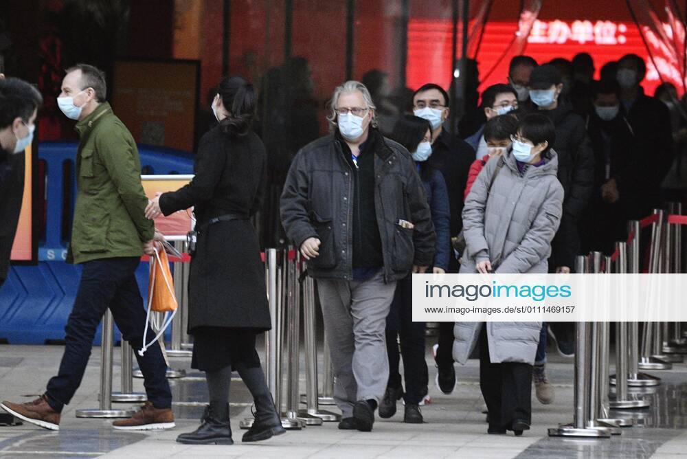 WHO probe into coronavirus origins in Wuhan Members of the World Health Organization s team investigating the origins of the coronavirus pandemic are pictured after visiting an exhibition about China s fight against the virus on Jan. 30, 2021, in Wuhan.
