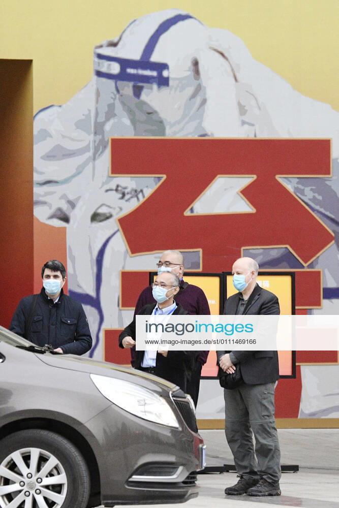 WHO probe into coronavirus origins in Wuhan Members of the World Health Organization s team investigating the origins of the coronavirus pandemic are pictured after visiting an exhibition about China s fight against the virus on Jan. 30, 2021, in Wuhan.
