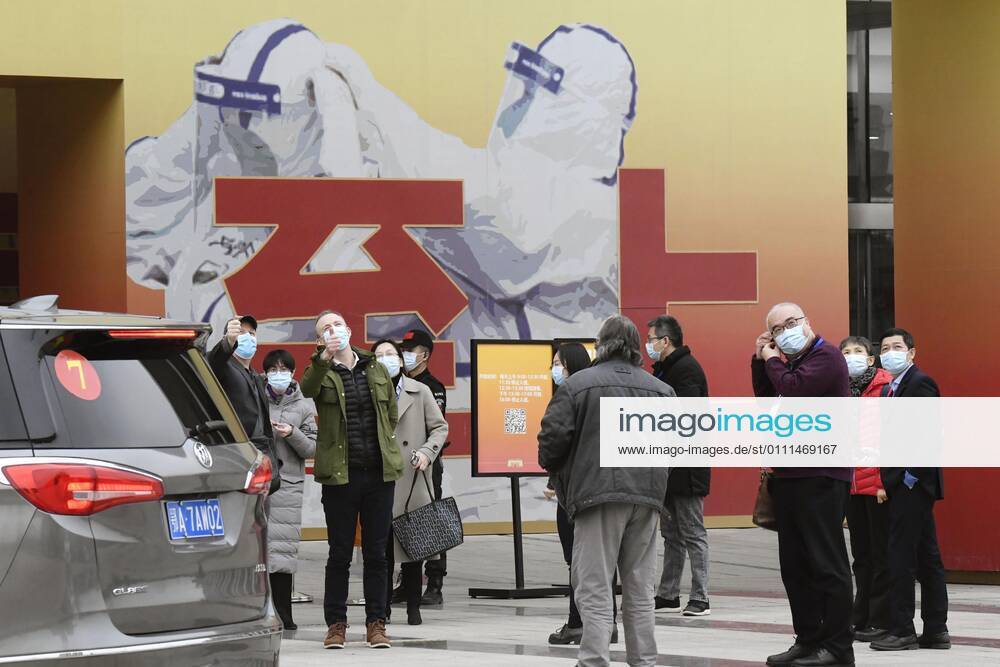 WHO probe into coronavirus origins in Wuhan Members of the World Health Organization s team investigating the origins of the coronavirus pandemic visit an exhibition about China s fight against the virus on Jan. 30, 2021, in Wuhan.