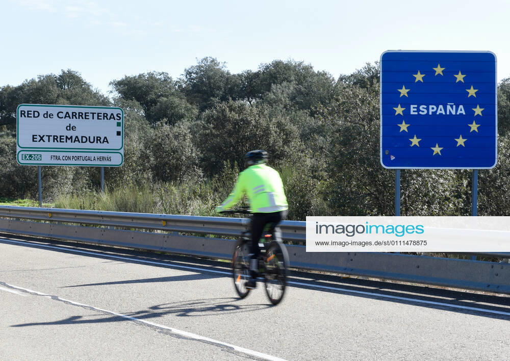 Valverde del Fresno, Spain. Portugal closes land borders. A man riding a bike crosses the land border between Spain and Portugal over the river Torto, in the North-West of Extremadura, this afternoon. From Sunday, Portugal will close its land border with Spain, for a period of at least two weeks in an attempt to contain the coronavirus. In this way, the Portuguese country, will reintroduce police controls along the1,214km border with Spain. However it is understood that essential movements will be still allowed, such for workers, medical reasons and goods s transportation.