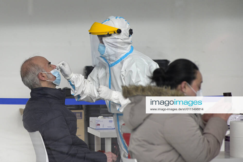 A man undergoes an antigen test in a mass screening device in A Coruna, Galicia (Spain), January 30, 2021. The Sergas has carried out this Saturday a mass screening of people aged between 18 and 60 years by antigen test, with the aim of detecting new cases of coronavirus that do not present symptoms. The device has been installed in Expocoruna. 30 JANUARY 2021;A CORUNA;GALICIA;SCREENING;MASS SCREENING;ANTIGEN TEST;HEALTH;EPIDEMIC;PANDEMIC;CORONAVIRUS M. Dylan LagenciaEP 01 30 2021 MADRID MADRID Spain
