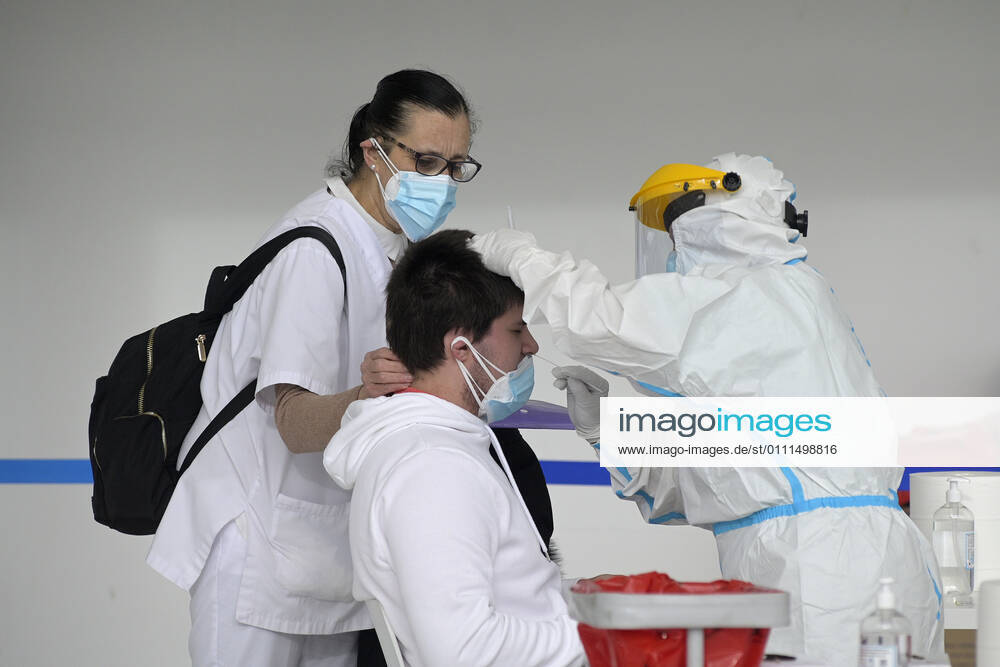 A man undergoes an antigen test in a mass screening device in A Coruna, Galicia (Spain), January 30, 2021. The Sergas has carried out this Saturday a mass screening of people aged between 18 and 60 years by antigen test, with the aim of detecting new cases of coronavirus that do not present symptoms. The device has been installed in Expocoruna. 30 JANUARY 2021;A CORUNA;GALICIA;SCREENING;MASS SCREENING;ANTIGEN TEST;HEALTH;EPIDEMIC;PANDEMIC;CORONAVIRUS M. Dylan LagenciaEP 01 30 2021 MADRID MADRID Spain