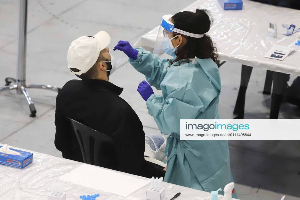A man undergoes an antigen test in a mass screening device at the Instituto Ferial de Vigo, in Vigo, Galicia (Spain), on January 30, 2021. As reported by the Xunta de Galicia, a total of 22,000 people have been invited to participate in this new mass population screening with antigen test at the Instituto Ferial de Vigo. This device began this Friday afternoon and will remain until next Wednesday. 30 JANUARY 2021;VIGO;MASS SCREENING;SCREENING;CORONAVIRUS;ANTIGENS;EPIDEMIC;PANDEMIC;GALICIA;PONTEVEDRA Marta Vazquez Rodriguez LagenciaEP 01 30 2021 VIGO, GALICIA VIGO, GALICIA Spain