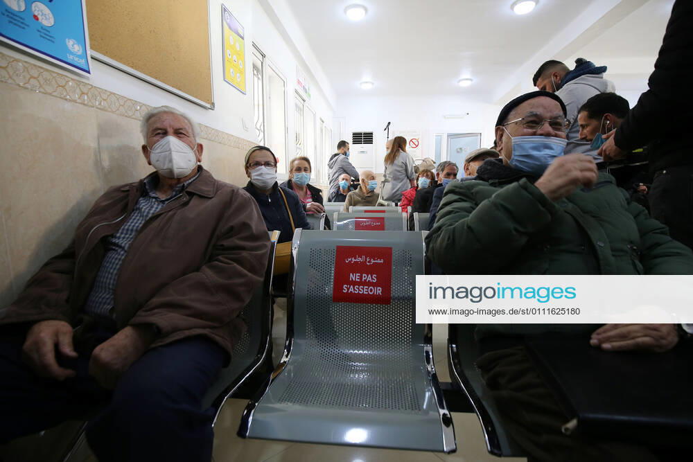(210131) -- ALGIERS, Jan. 31, 2021 () -- People wait for injection of COVID-19 vaccine in a clinic in Algiers, Algeria, Jan. 31, 2021. Algeria on Sunday reported 217 new COVID-19 cases, raising the total infections in the North African country to 107,339. Algeria s COVID-19 vaccination kicked off on Jan. 30 in the town of Blida, where the country s first coronavirus case was reported in early 2020. () AlGERIA-ALGIERS-COVID-19-VACCINATION Xinhua