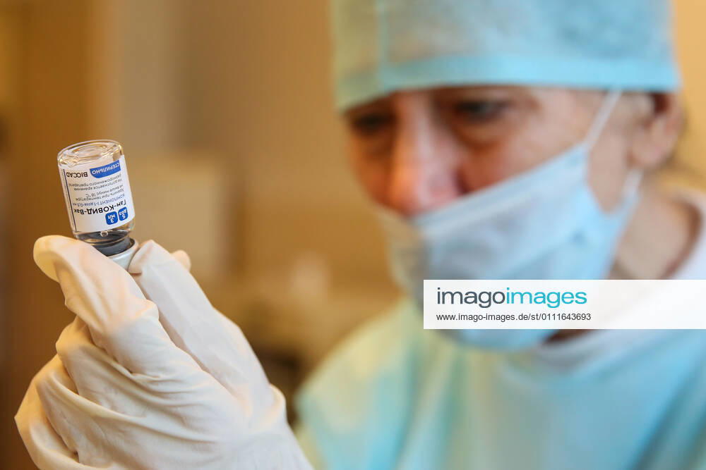 A medical worker prepares a syringe during vaccination with the Gam-COVID-Vak (Sputnik V) vaccine against COVID-19 at Sochi s City Hospital No 4. Dmitry Feoktistov TASS TS0F5AA9