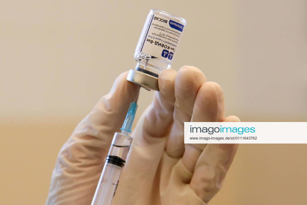A medical worker prepares a syringe during vaccination with the Gam-COVID-Vak (Sputnik V) vaccine against COVID-19 at Sochi s City Hospital No 4. Dmitry Feoktistov TASS TS0F5AB0