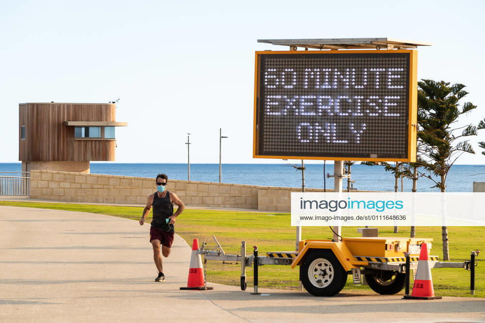 WA CORONAVIRUS COVID19, A sign stating 60 minutes of exercise only is seen at Scarborough beach in Perth, Monday, February 1, 2021. West Australian Premier Mark McGowan yesterday called for a five-day lockdown for metropolitan Perth and two nearby regions after a COVID-19 hotel quarantine breach. ( NO ARCHIVING, , NO USE IN BOOKS WITHOUT CONSENT