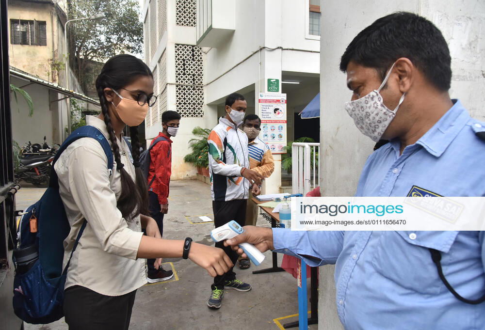 (210201) -- HYDERABAD, Feb. 1, 2021 -- A student gets her body temperature measured before entering a school after a gap of almost a year following COVID-19 guidelines in Hyderabad, capital of India s southern state of Telengana on Feb. 1, 2021. (Str Xinhua) INDIA-HYDERABAD-SCHOOL REOPENS ParthaxSarkar