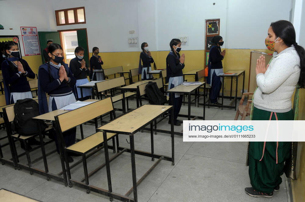Students attending morning prayers in their classroom after classes resumed for grades 6 to 8 for the first time since the lockdown, at a government school in Sector 50, on February 1, 2021 in Chandigarh, India. (Photo by Ravi Kumar Hindustan Times) Daily Life Amid Covid-19 Pandemic In India