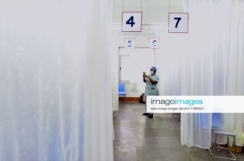 A BMC health worker takes a photograph during a Covid-19 vaccination drive at Nair Hospital, on February 1, 2021 in Mumbai, India. (Photo by Anshuman Poyrekar Hindustan Times) India s Covid-19 Vaccination Drive