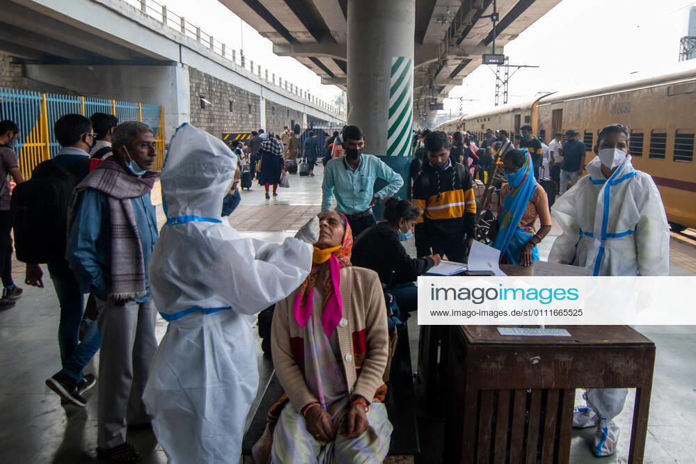 A healthcare worker conducts swab tests of travellers for coronavirus infection, at Dadar station, on February 1, 2021 in Mumbai, India. (Photo by Pratik Chorge Hindustan Times) Daily Life Amid Covid-19 Pandemic In India