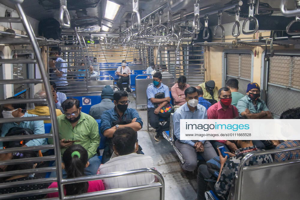 Travellers in a suburban local train on the first day when local train services starts for general public, on February 1, 2021 in Mumbai, India. Travel by local trains, lifeline for millions of people living in Mumbai and surrounding satellite towns, was severely restricted after the coronavirus outbreak in March 2020. (Photo by Pratik Chorge Hindustan Times) Mumbai Local Trains Resume Services For General Public