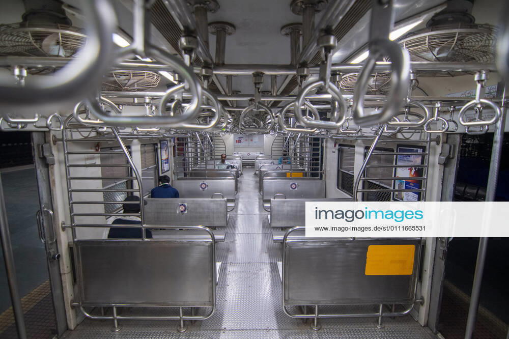Few travellers in a suburban local train on the first day when local train services starts for general public, at Kalyan, on February 1, 2021 in Mumbai, India. Travel by local trains, lifeline for millions of people living in Mumbai and surrounding satellite towns, was severely restricted after the coronavirus outbreak in March 2020. (Photo by Pratik Chorge Hindustan Times) Mumbai Local Trains Resume Services For General Public