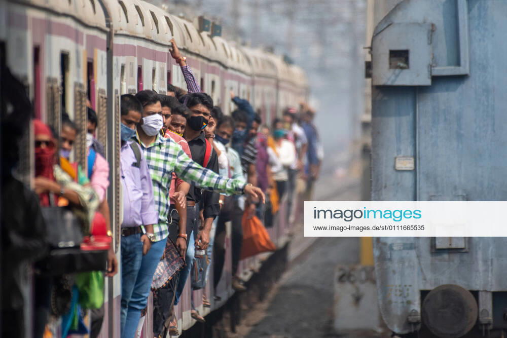 Travellers in a suburban local train on the first day when local train services starts for general public, at Kurla, on February 1, 2021 in Mumbai, India. Travel by local trains, lifeline for millions of people living in Mumbai and surrounding satellite towns, was severely restricted after the coronavirus outbreak in March 2020. (Photo by Pratik Chorge Hindustan Times) Mumbai Local Trains Resume Services For General Public