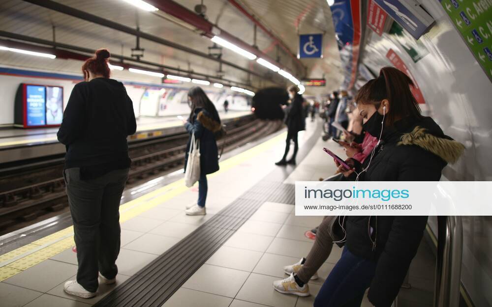 Several passengers wait on a metro platform at Sol station on the same day that new restrictions come into force in the region by Covid-19, in Madrid, (Spain), on February 1, 2021. As of today in Madrid, 19 more basic health zones (ZBS) have been extended to have restrictions, from which it is not possible to enter or leave without a justified cause such as work or studies. These 19 are in addition to those already restricted previously, which is why at the moment there are a total of 71 basic health zones (ZBS) and 30 localities with restrictions in the region. 01 FEBRUARY 2021;RESTRICTIONS;MADRID;COVID19;METRO;RENFE;TRANSPORT ZBS Eduardo Parra LagenciaEP 02 01 2021 Madrid Madrid Spain